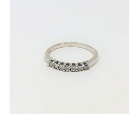 An 18ct white gold diamond set 'Forever' ring, with diamond set to inside of shank, approximately 0.35 carat, size T1/2. 