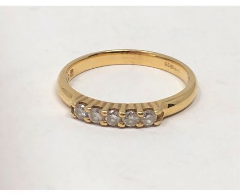 An 18ct gold five stone diamond ring 