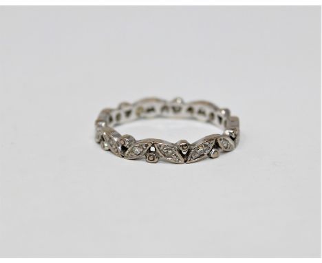 A white gold diamond set full eternity ring, size N1/2 CONDITION REPORT: Apparently unmarked. 3.0g. 