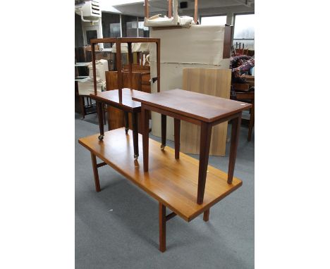 A mid 20th century teak coffee table, two further coffee tables and a lamp table 