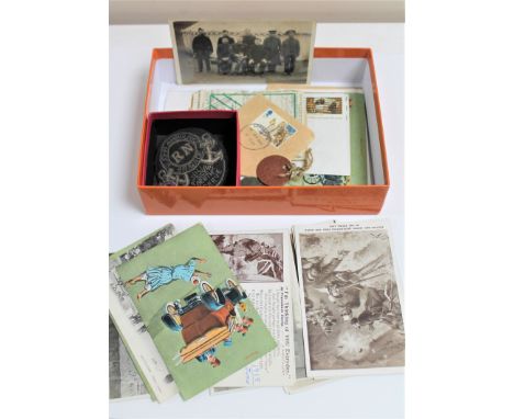 A box of WWI era postcards including military, loose stamps, St. John's Ambulance sew on patch, buttons, pair of leather RAF 