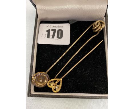 Three 9ct gold tie pins, one Diamond and one Pearl