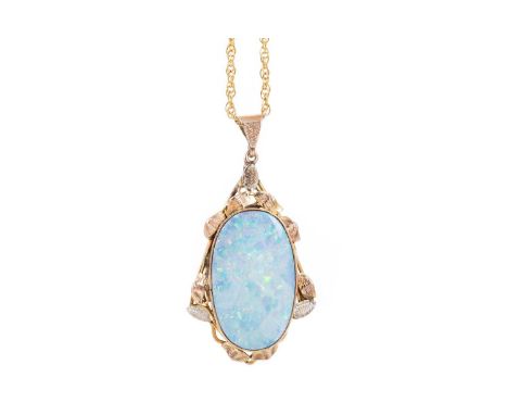 OPAL DOUBLET PENDANT within a nine carat gold mount, on chainGenerally worn. Chipped to the surface. No breakages to the chai