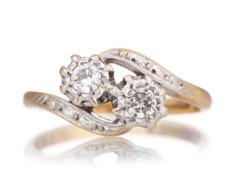 DIAMOND TWO STONE RING the illusion set diamonds totalling approximately 0.20 carats, marked 18CT, size K 1/2Qty: 2.9g