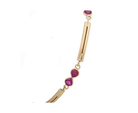 SYNTHETIC RUBY BRACELET the bar links interspaced by pairs of rubies, in eighteen carat goldQty: 11.9g