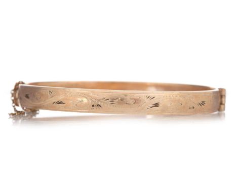 GOLD ENGRAVED BANGLE marked 9CTQty: 18.8g