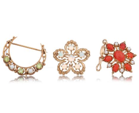 TWO BROOCHES AND A PENDANT the flower brooch set with opals, along with peridot and pearl crescent moon brooch and a coral an