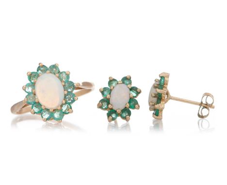 OPAL AND EMERALD CLUSTER RING ALONG WITH A PAIR OF EARRINGS TO MATCH  each with an oval opal within a halo of emeralds, in ni