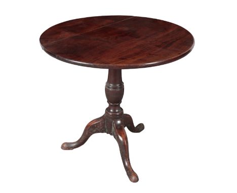 A GEORGE III MAHOGANY TRIPOD TABLE 18th century and later, on turned stem to downswept legs and pad feet, 65.5cm high x 73.5c