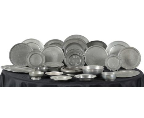 A LARGE COLLECTION OF PEWTER including plates, bowls and serving trays 18th century and later (a lot)Provenance: The Christop