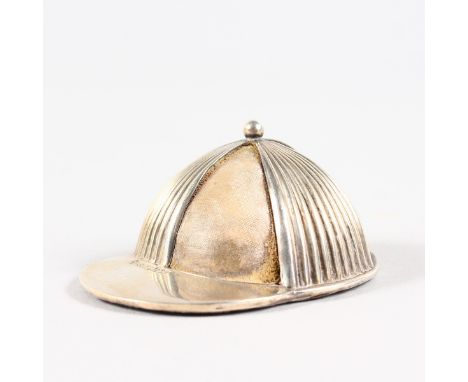 A GOOD THREE DIVISION JOCKEY CAP PIN CUSHION with leather base. Birmingham 1897.  Maker: CS & FS.  6cms.
