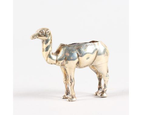 A SMALLER CAMEL PIN CUSHION. Birmingham 1911.  Maker: A. & L. LTD.  6cms long, 5cms high.