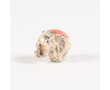 A MINIATURE ELEPHANT PIN CUSHION. London 1965.  Maker: AN.  3cms long.