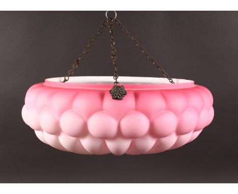 A LARGE "BURMESE" WARE PINK GLASS LIGHT GLOBE with three hanging chains. 16ins diameter.