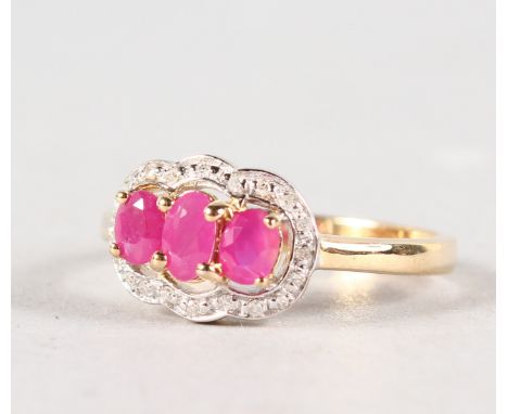 A 9CT YELLOW GOLD, RUBY AND DIAMOND RING.