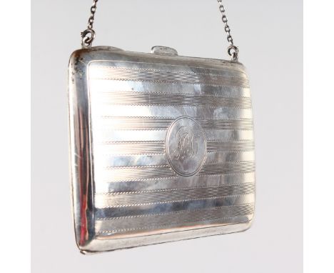 AN ENGINE TURNED SILVER PURSE. Birmingham 1912.