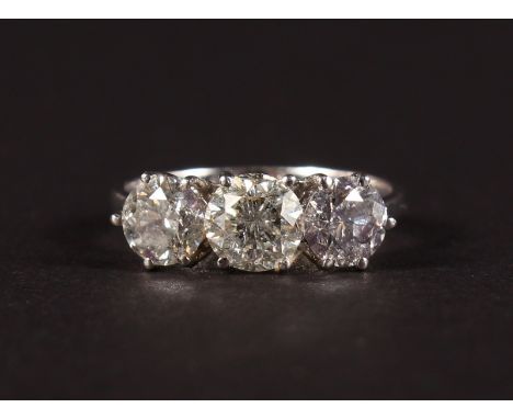 A FINE 18CT WHITE GOLD THREE STONE DIAMOND RING, 2.25CTS.