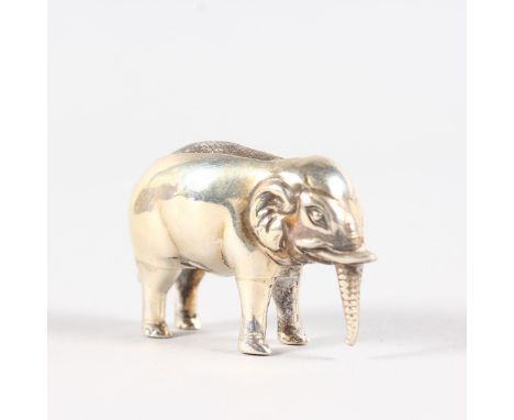 A MINIATURE ELEPHANT PIN CUSHION. Birmingham 1906.  Maker: A & L LTD.  4.5cms long.