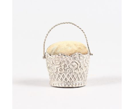 A CONTINENTAL SILVER BASKET PIN CUSHION. 3cms high.