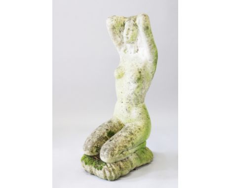 A LARGE COMPOSITION STONE KNEELING NUDE, kneeling on a cushion. 3ft 3ins high.