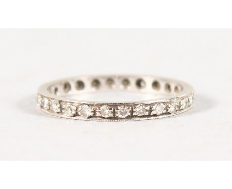 AN 18CT WHITE GOLD AND DIAMOND ETERNITY RING.