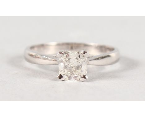 AN 18CT WHITE GOLD SOLITAIRE DIAMOND RING.