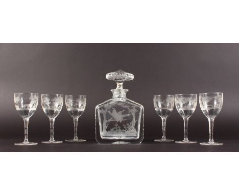 A GOOD CUT AND ENGRAVED DECANTER, decorated with a woodland scene and game birds in flight; together with six matching wine g