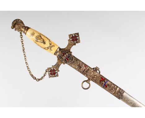 A MASONIC SWORD, with ivorine grip and enamel decoration. 3ft 2ins long.