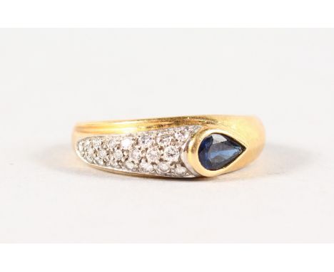 AN 18CT YELLOW GOLD, DIAMOND AND SAPPHIRE RING.