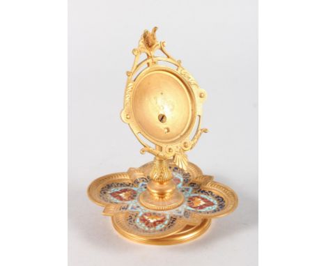 A SMALL FRENCH BRASS AND CHAMPLEVE ENAMEL WATCH HOLDER. 6ins high.