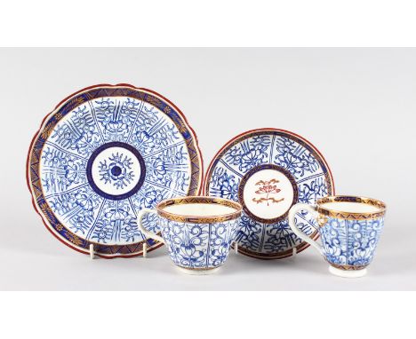 AN 18TH CENTURY WORCESTER PEDESTAL COFFEE CUP, TEACUP, SAUCER AND SIDE PLATE, painted with the So-called Royal Lily pattern a