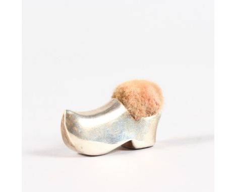 A MINIATURE CLOG PIN CUSHION. Sheffield 1919.  Maker: SBL.  3.5cms long.