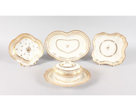AN 18TH CENTURTY CAUGHLEY TUREEN, COVER AND STAND and three matching dishes with gilded decoration.