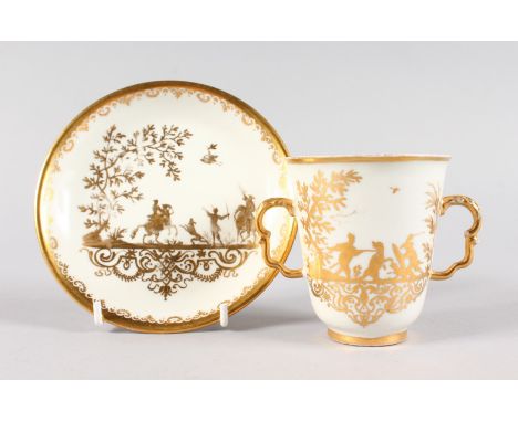 A RARE MEISSEN BEAKER AND SAUCER, CIRCA. 1725, decorated at AUGSBURG, in gold with hunting scenes.