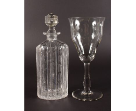 A GEORGIAN OVAL SHAPED CUT DECANTER & STOPPER and A LARGE GOBLET (2).