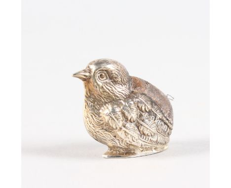 A MINIATURE CHICK PIN CUSHION. Birmingham 1903.  Maker: L. & S.  3cms high.