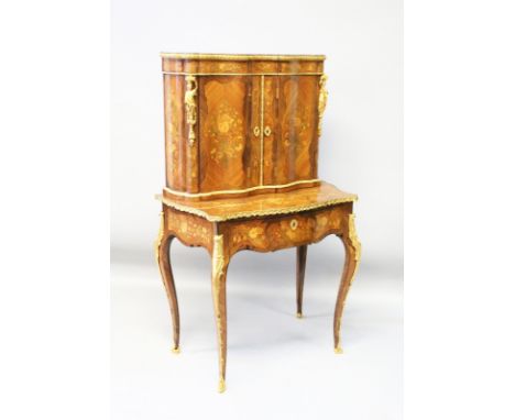 A GOOD 19TH CENTURY FRENCH KINGWOOD, MARQUETRY AND ORMOLU BONHEUR-DU-JOUR, the upper section with a pair of serpentine doors 