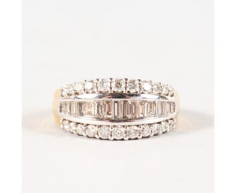 A SUPERB 18CT WHITE GOLD TRIPLE ROW DIAMOND RING.