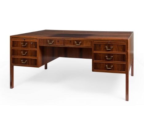 OLE WANSCHER (Denmark, 1903-1985).Writing table.Rosewood.Measurements: 74 x 167 x 84 cm.The desk table presented here, a mode