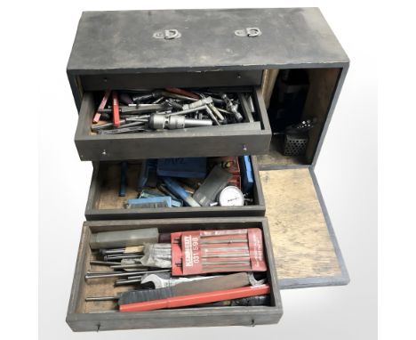 A vintage joiner's tool chest containing various tools and hardware, hand tools, allen keys, etc.