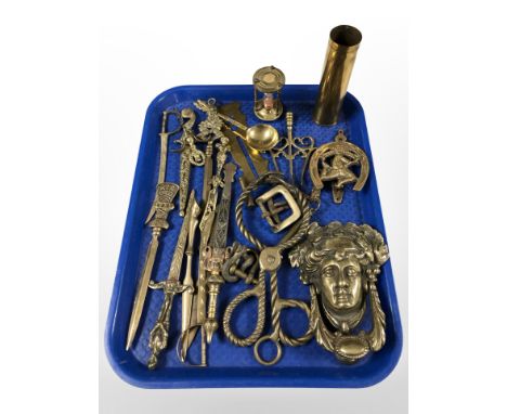 Brass wares to include letter knives, figural door knocker, hour glass, ammunition shell, military issue button polisher, etc