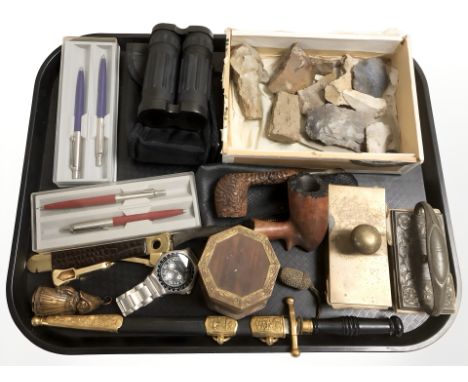 Two rustic pipes, letter opener in the form of a naval officer's dagger, pens, two desk blotters, flint and other geology spe