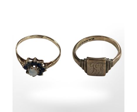 A 9ct yellow gold signet ring together with a 9ct sapphire and opal cluster ring. CONDITION REPORT: Gross weight: 3.4g. 