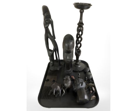 A group of African hard wood busts and figures, comb, smoking stand etc 