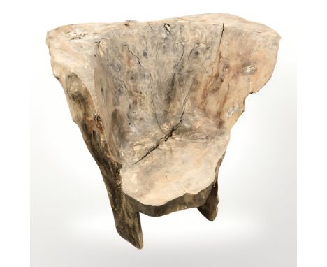 A rustic burr wood tree trunk armchair, width 67 cm  