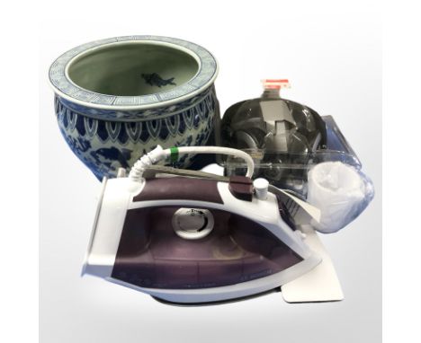 A reproduction Chinese porcelain planter, a pair of headphones, a Bosch iron. (1 box)