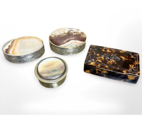 A 19th century tortoise shell snuff box, width 7.5 cm, together with three further gilded metal and polished hardstone table 