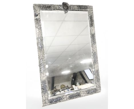 An antique large silver mounted easel mirror, London marks, 64 cm high x 43 cm wide (Losses)