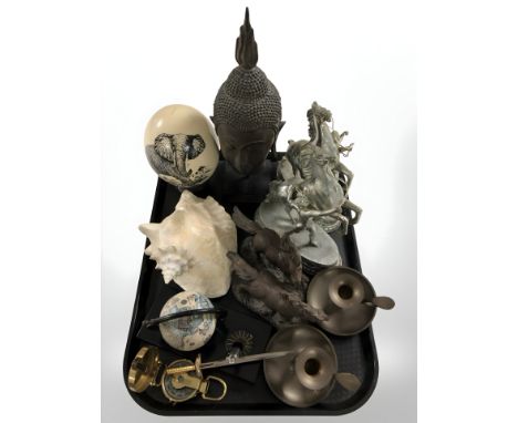 A group of ornaments including decorated ostrich egg, sea shell, two pairs of horse figures, pair of chamber sticks, desk sta