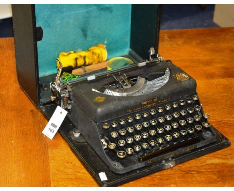 A vintage imperial typewriter, 'The Good Companion Model', with carry case
